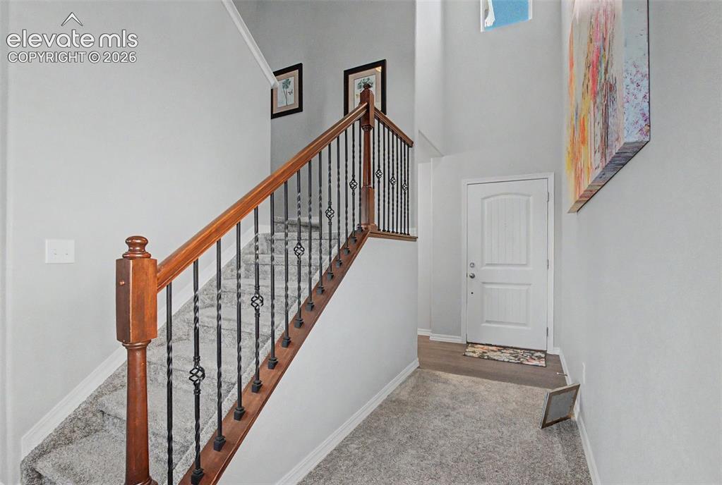 10957 Avena Road Peyton, CO 80831 - Photo 4 of 34 Beautiful metal baluster upgrade