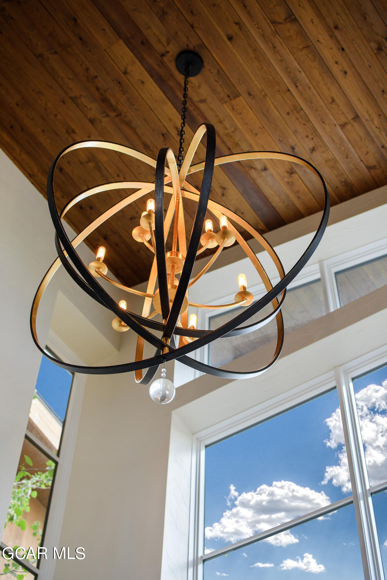 728 Cozens Ridge Fraser, CO 80442 - Photo 42 of 61 Stair Chandelier Detail