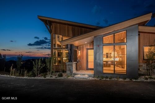 728 Cozens Ridge Fraser, CO 80442 - Photo 60 of 61 Front Entry Night Elevation