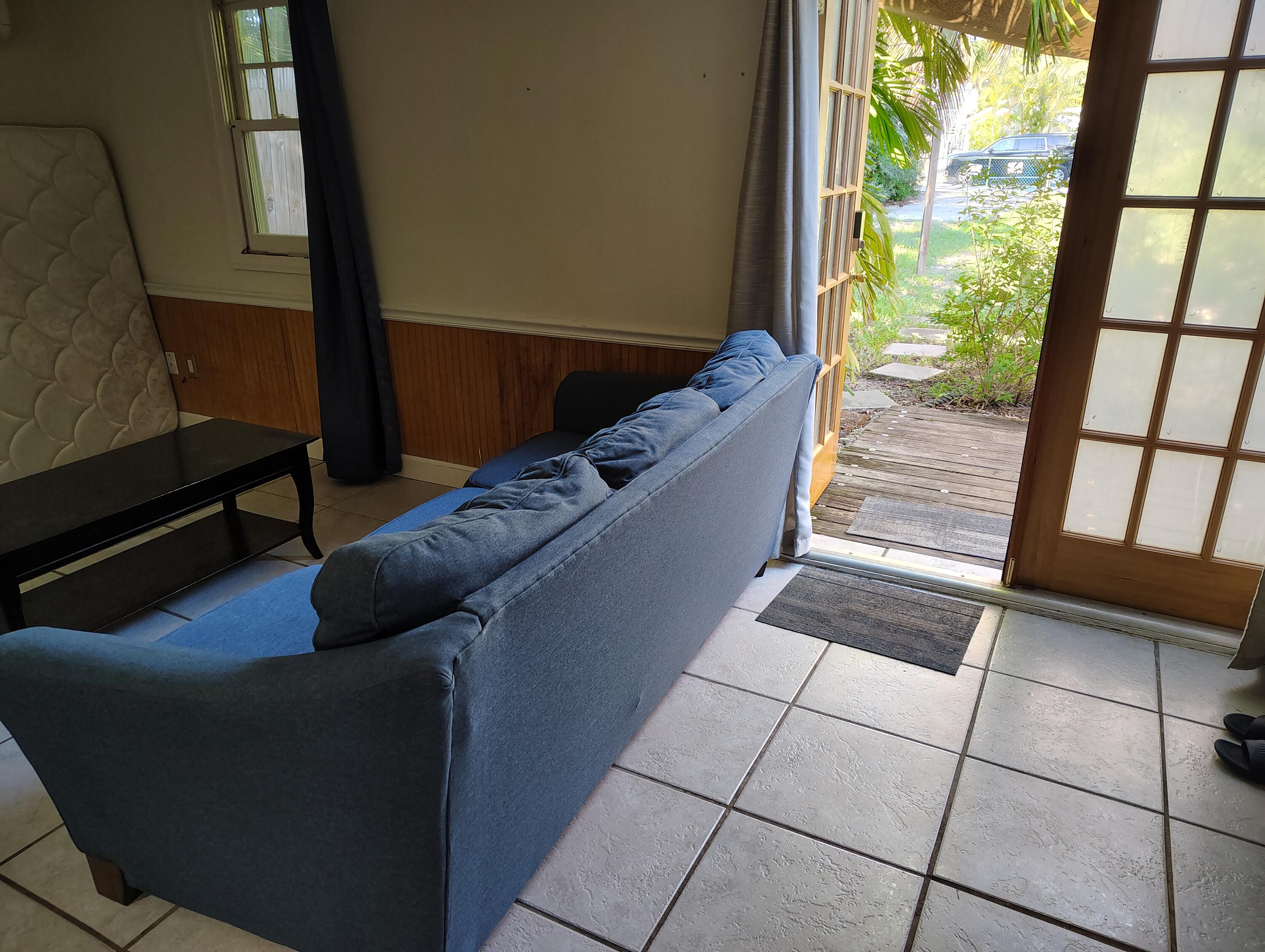 a living room with hard wood floor