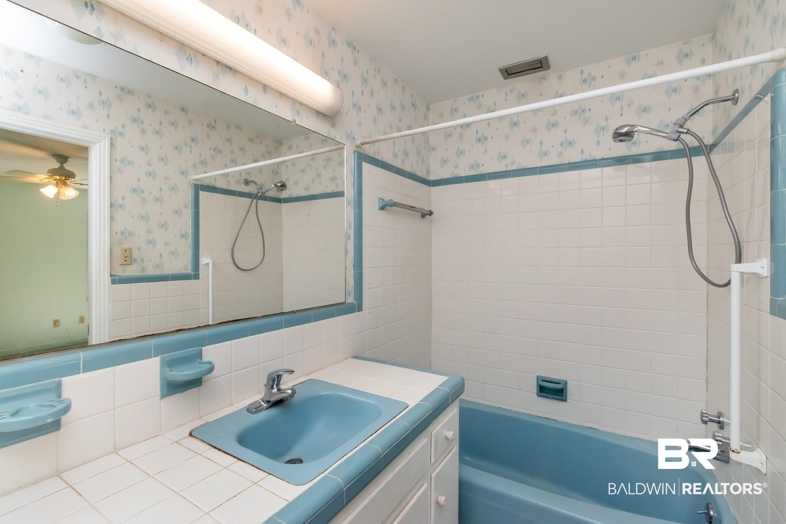 4543 Kingsway Drive Mobile, AL 36608 - Photo 14 of 28 Full bath featuring bathtub / shower combination, visible vents, a ceiling fan, vanity, and wallpapered walls