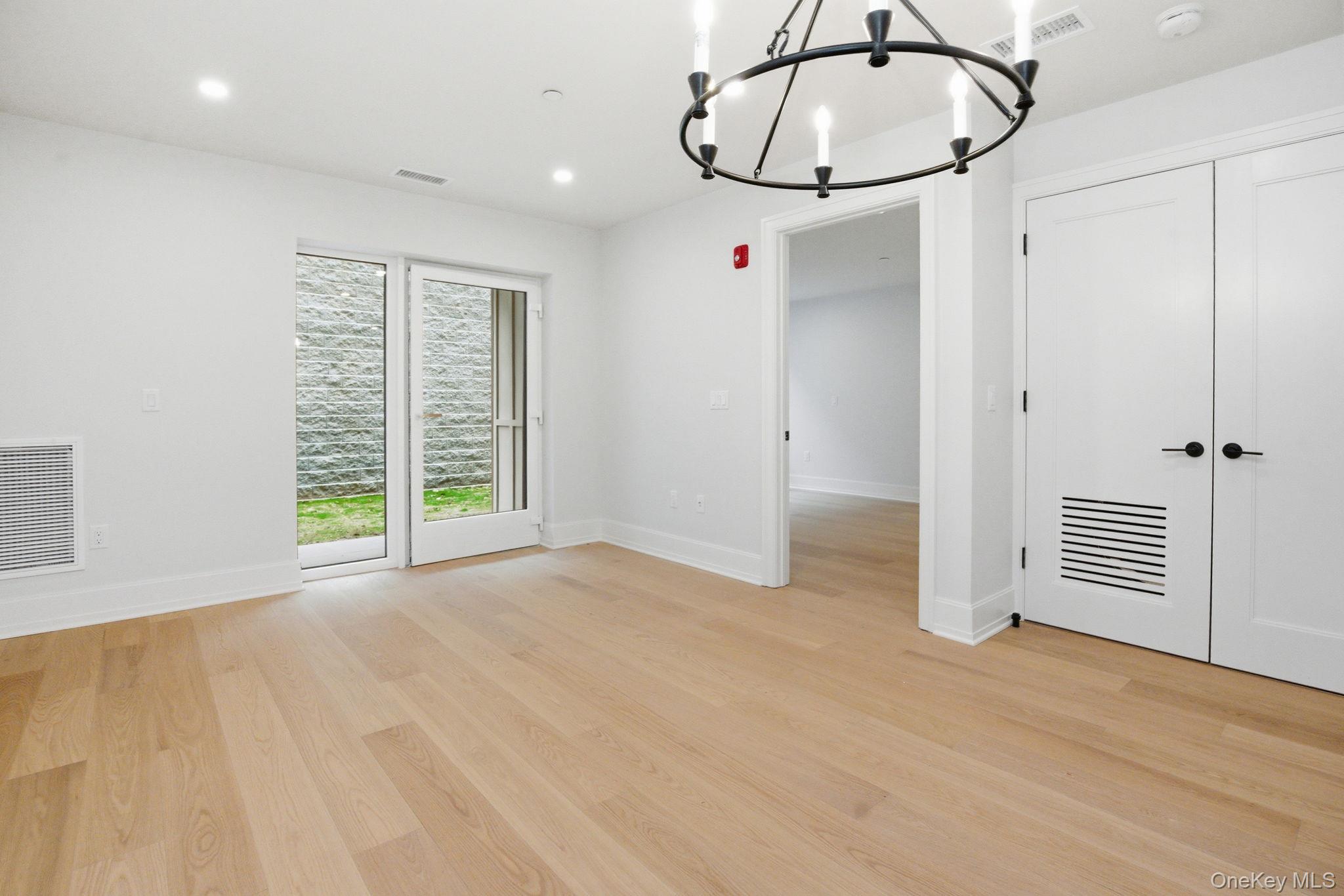 25 South Riverside Avenue, Unit 107 Croton-on-Hudson, NY 10520 - Photo 12 of 42 a view of an empty room with a window