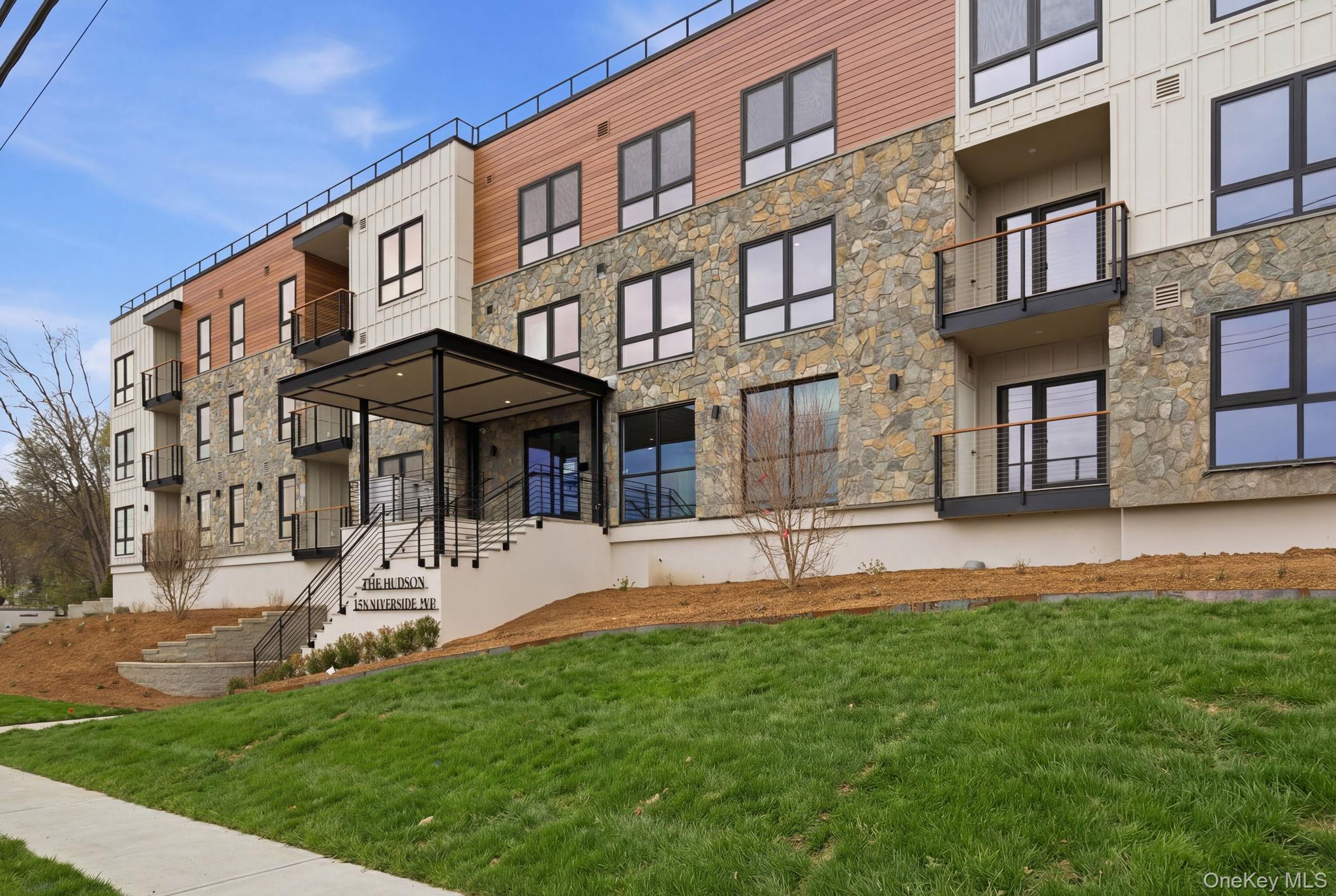 25 South Riverside Avenue, Unit 107 Croton-on-Hudson, NY 10520 - Photo 26 of 42 a view of a house with a yard porch and sitting area