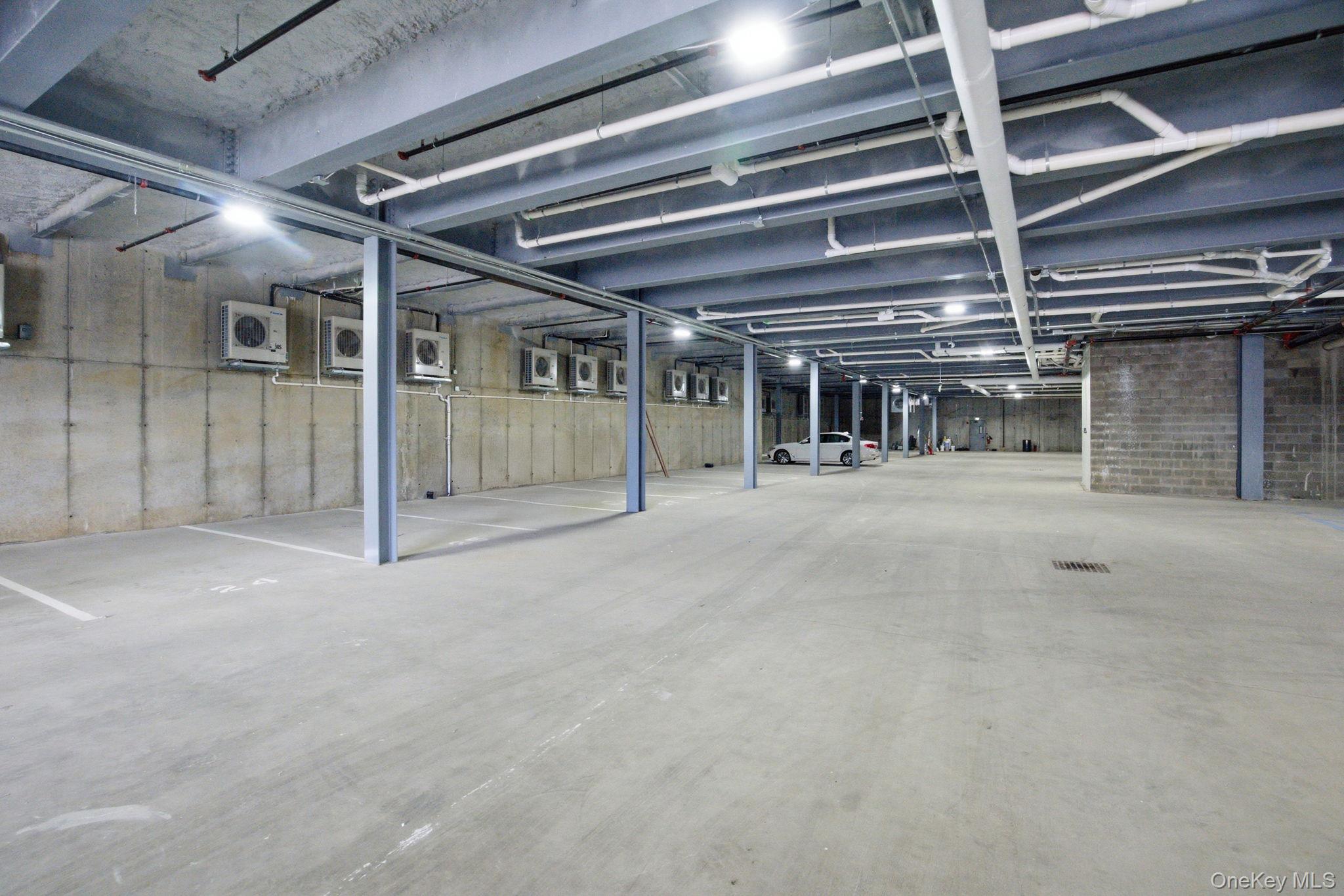 25 South Riverside Avenue, Unit 107 Croton-on-Hudson, NY 10520 - Photo 35 of 42 a view of an empty room with a garage