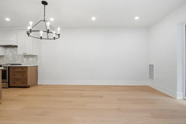 a view of a room with an empty space