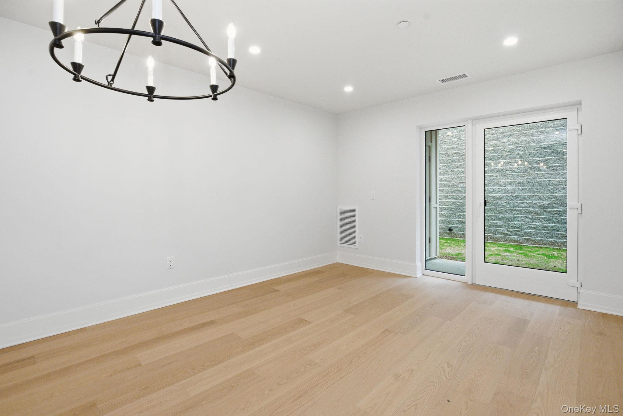 25 South Riverside Avenue, Unit 107 Croton-on-Hudson, NY 10520 - Photo 9 of 42 a view of an empty room with a window