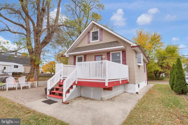 a house with trees in front of it