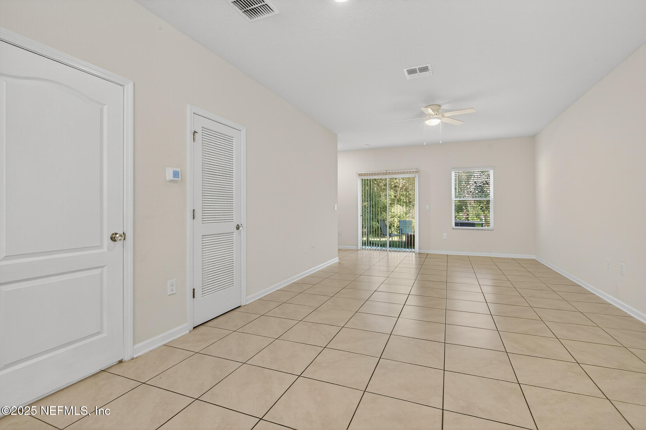 85 Talulla Trail St. Augustine, FL 32095 - Photo 18 of 55 a view of an empty room and window