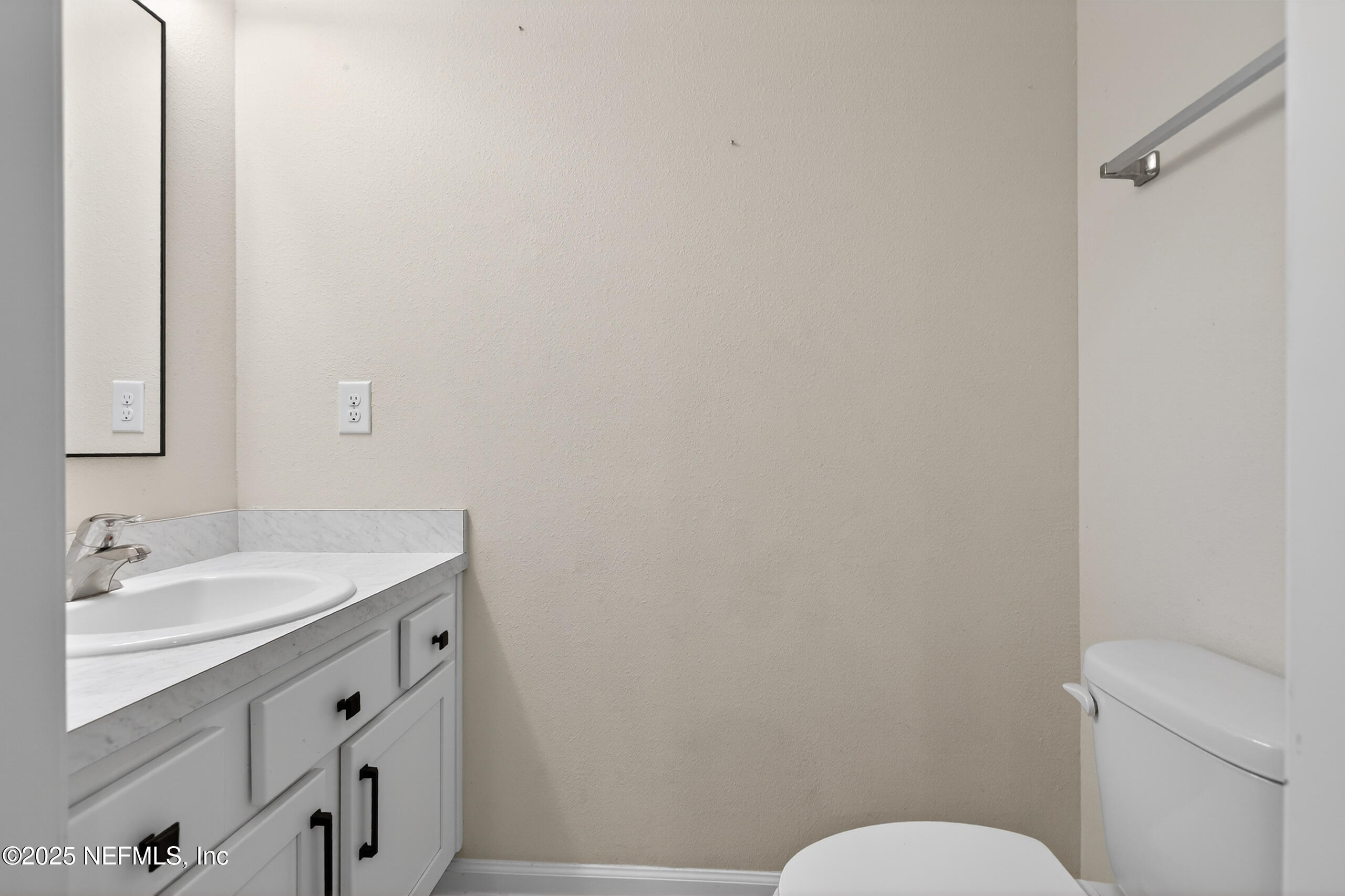 85 Talulla Trail St. Augustine, FL 32095 - Photo 19 of 55 a bathroom with a granite countertop toilet and a sink