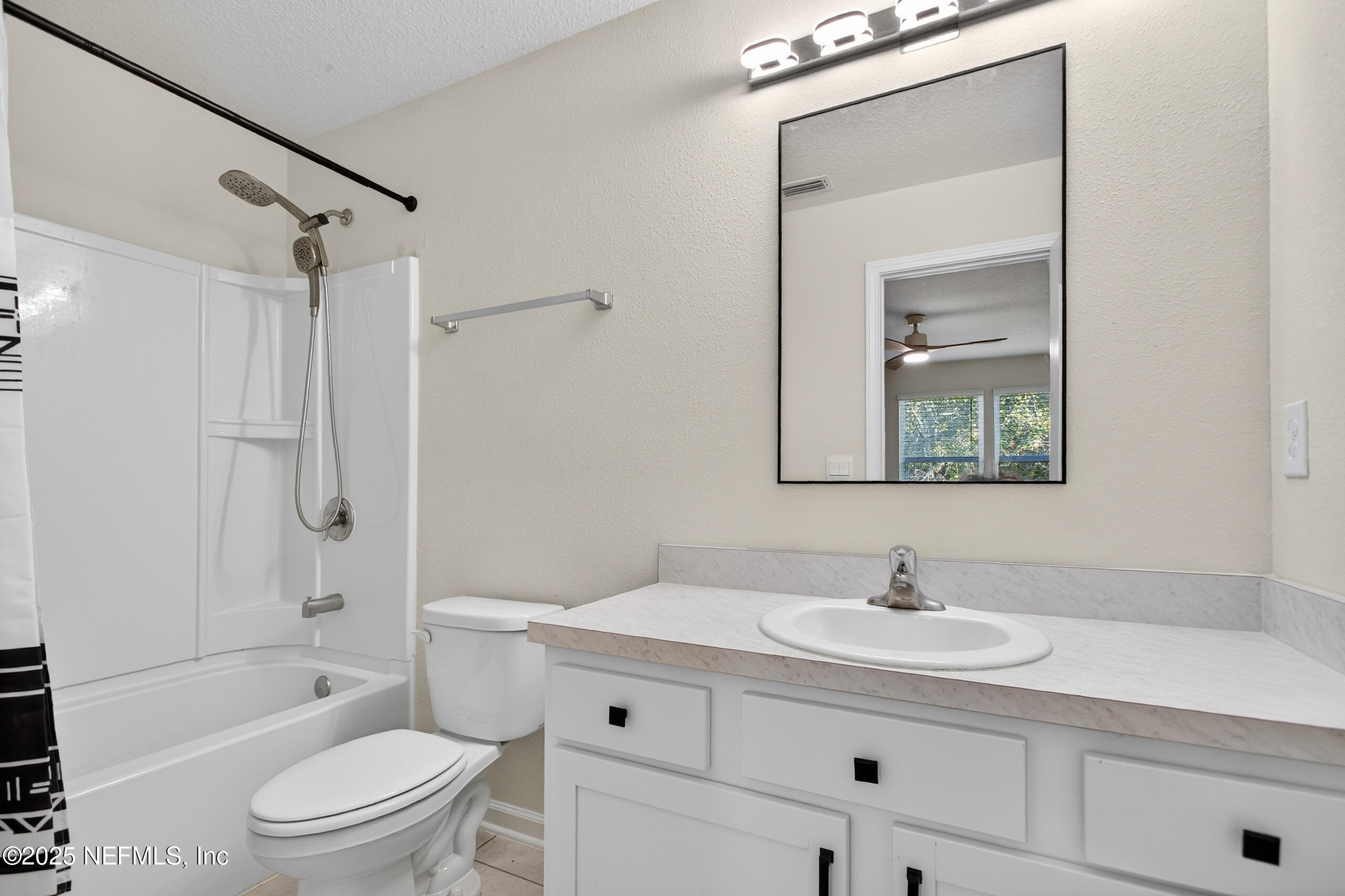 85 Talulla Trail St. Augustine, FL 32095 - Photo 25 of 55 a bathroom with a sink a toilet and shower