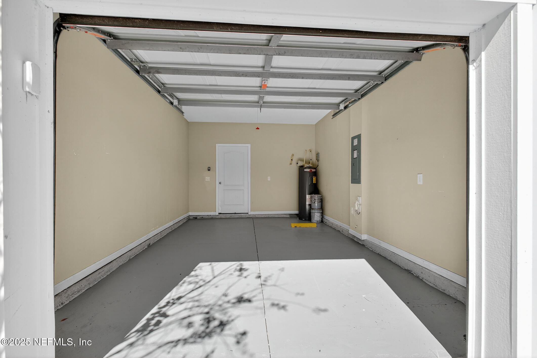 85 Talulla Trail St. Augustine, FL 32095 - Photo 33 of 55 a view of a hallway with a white walls and wooden floor