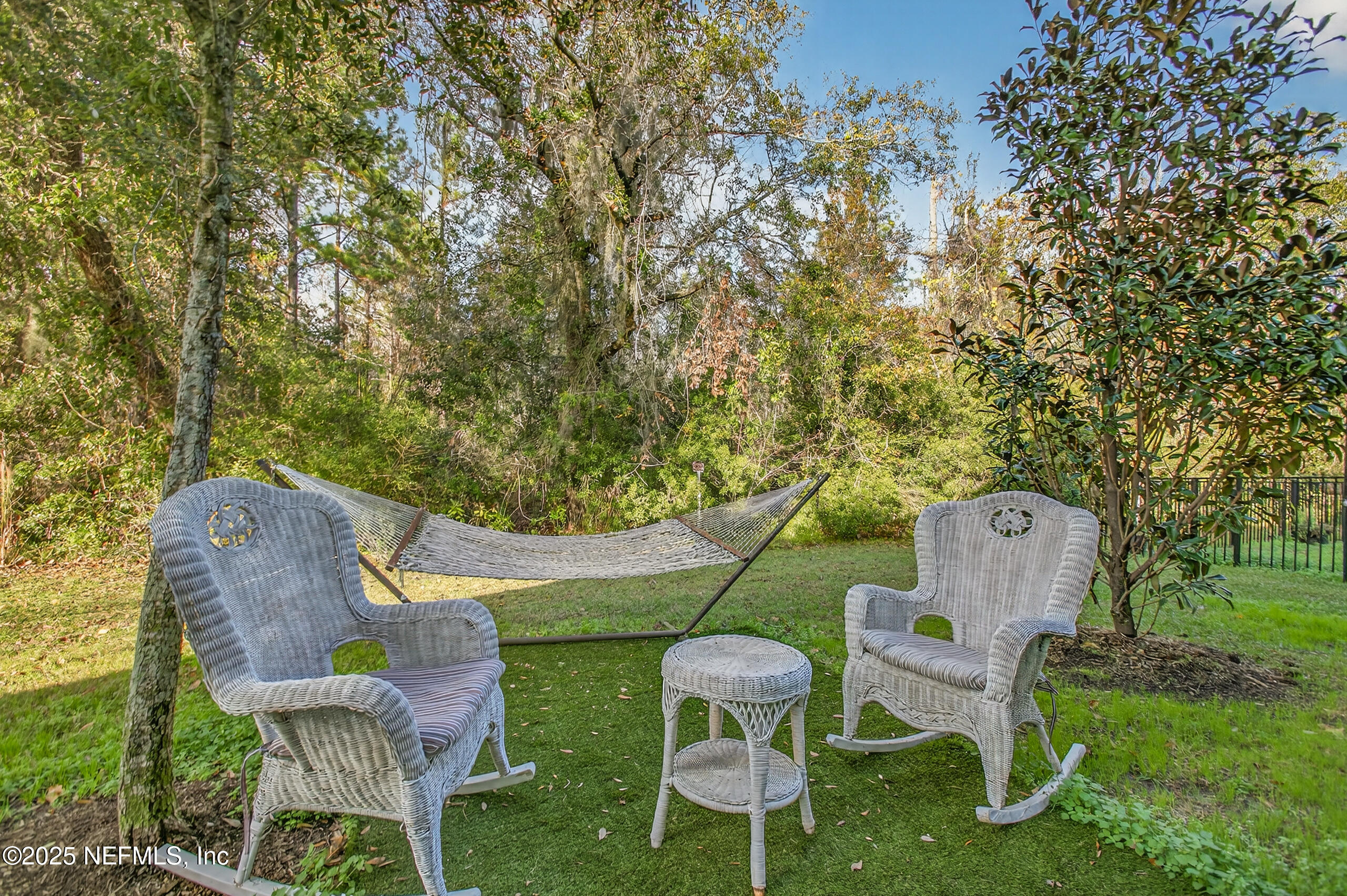 85 Talulla Trail St. Augustine, FL 32095 - Photo 35 of 55 a backyard of a house with table and chairs
