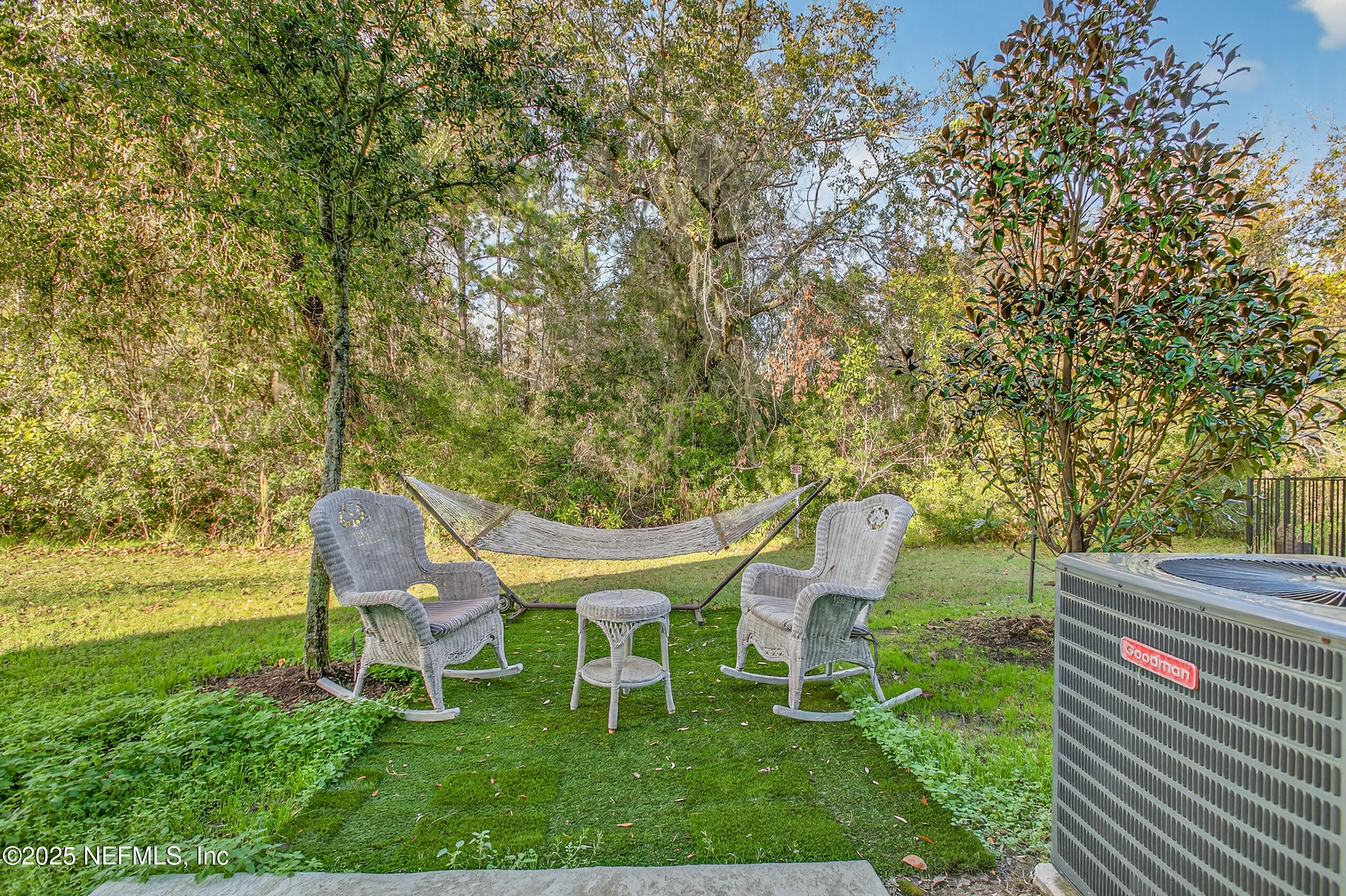85 Talulla Trail St. Augustine, FL 32095 - Photo 38 of 55 a garden with trees in front of it