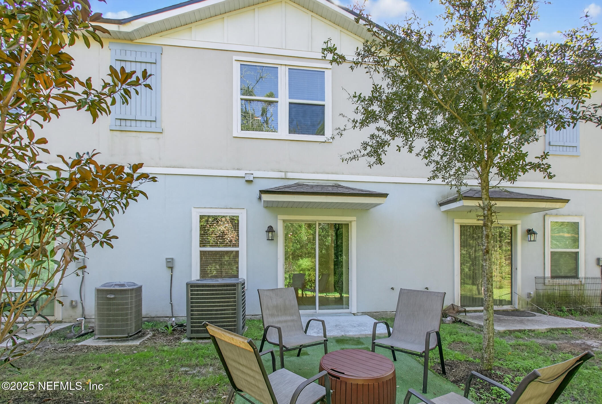 85 Talulla Trail St. Augustine, FL 32095 - Photo 39 of 55 a view of a house with backyard sitting area and garden