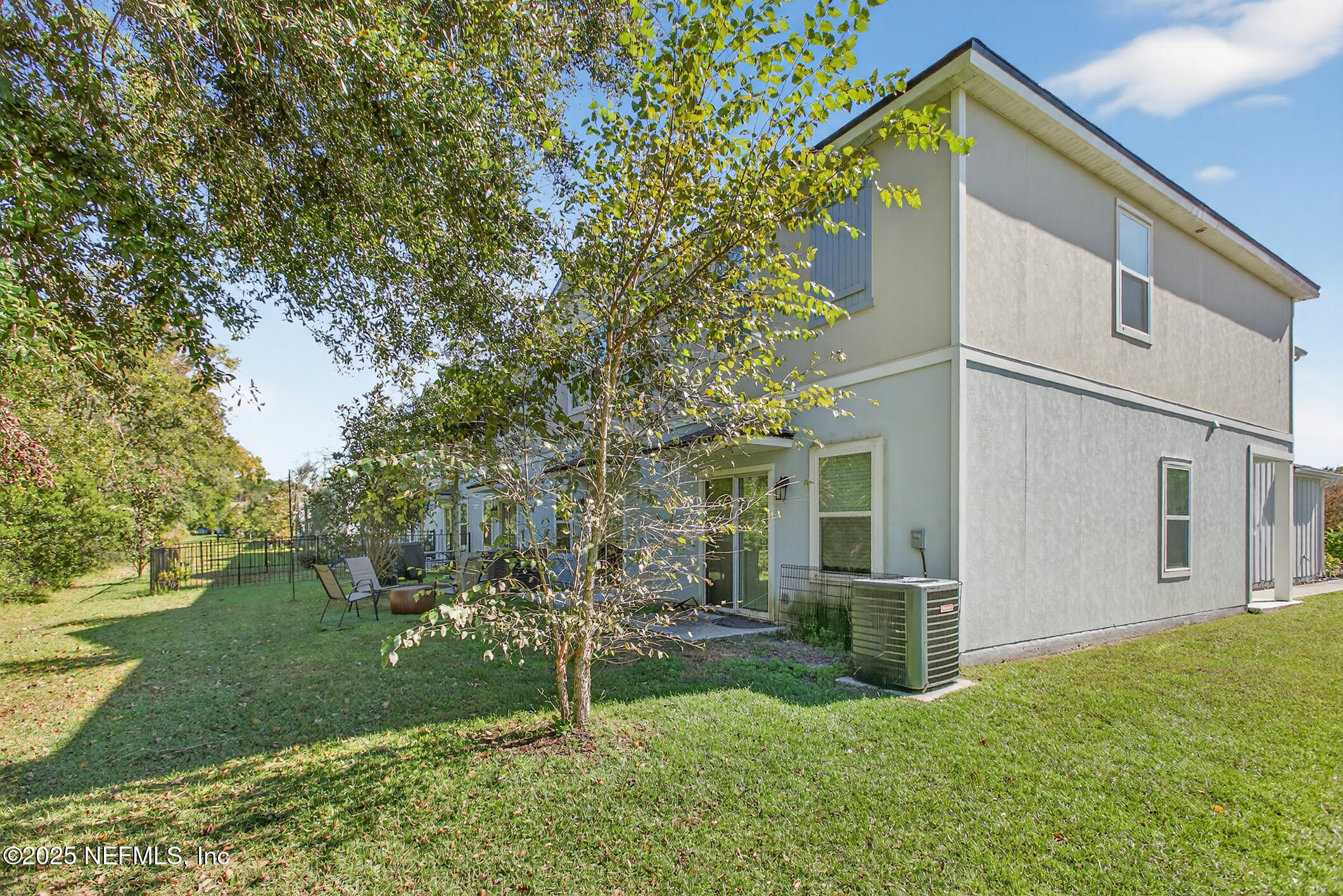 85 Talulla Trail St. Augustine, FL 32095 - Photo 40 of 55 a view of backyard of house and trees