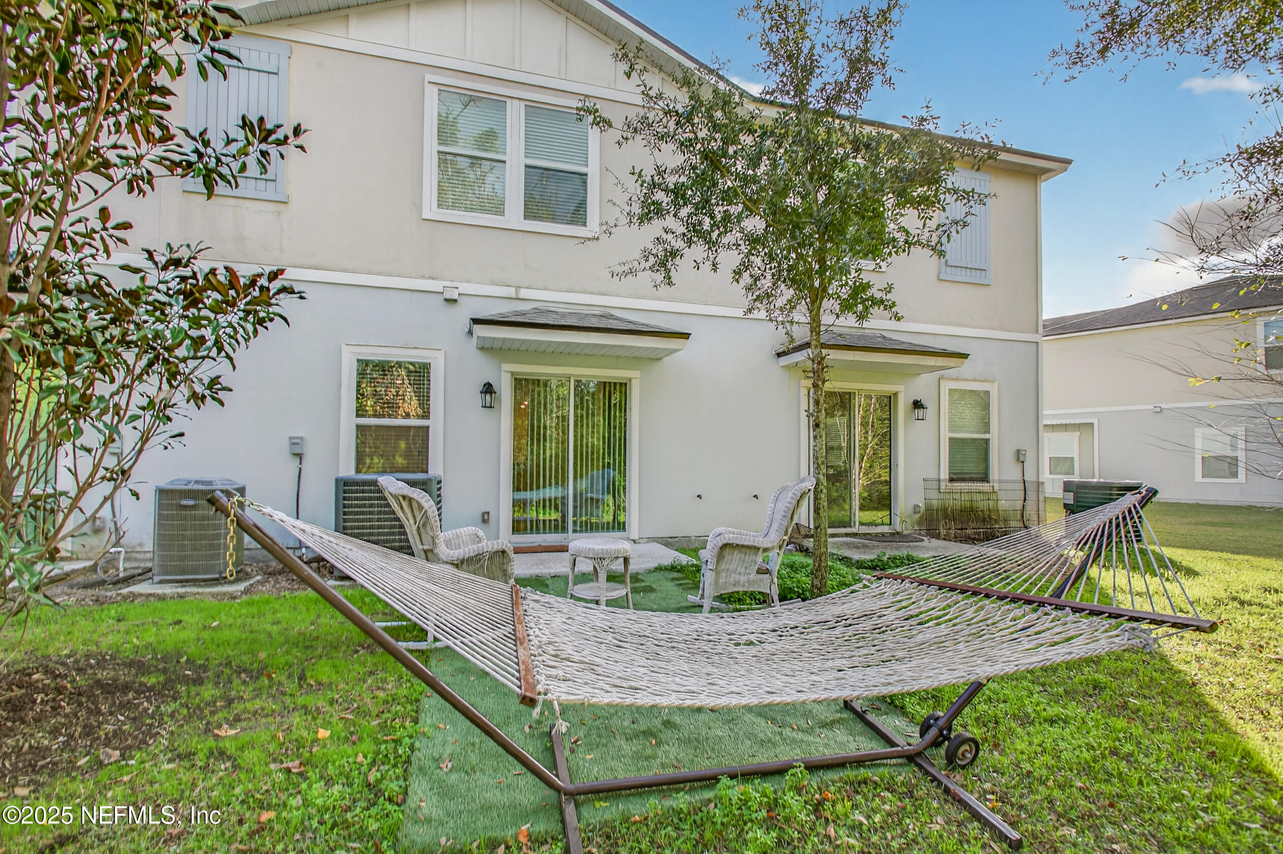 85 Talulla Trail St. Augustine, FL 32095 - Photo 41 of 55 a view of a house with backyard and sitting area