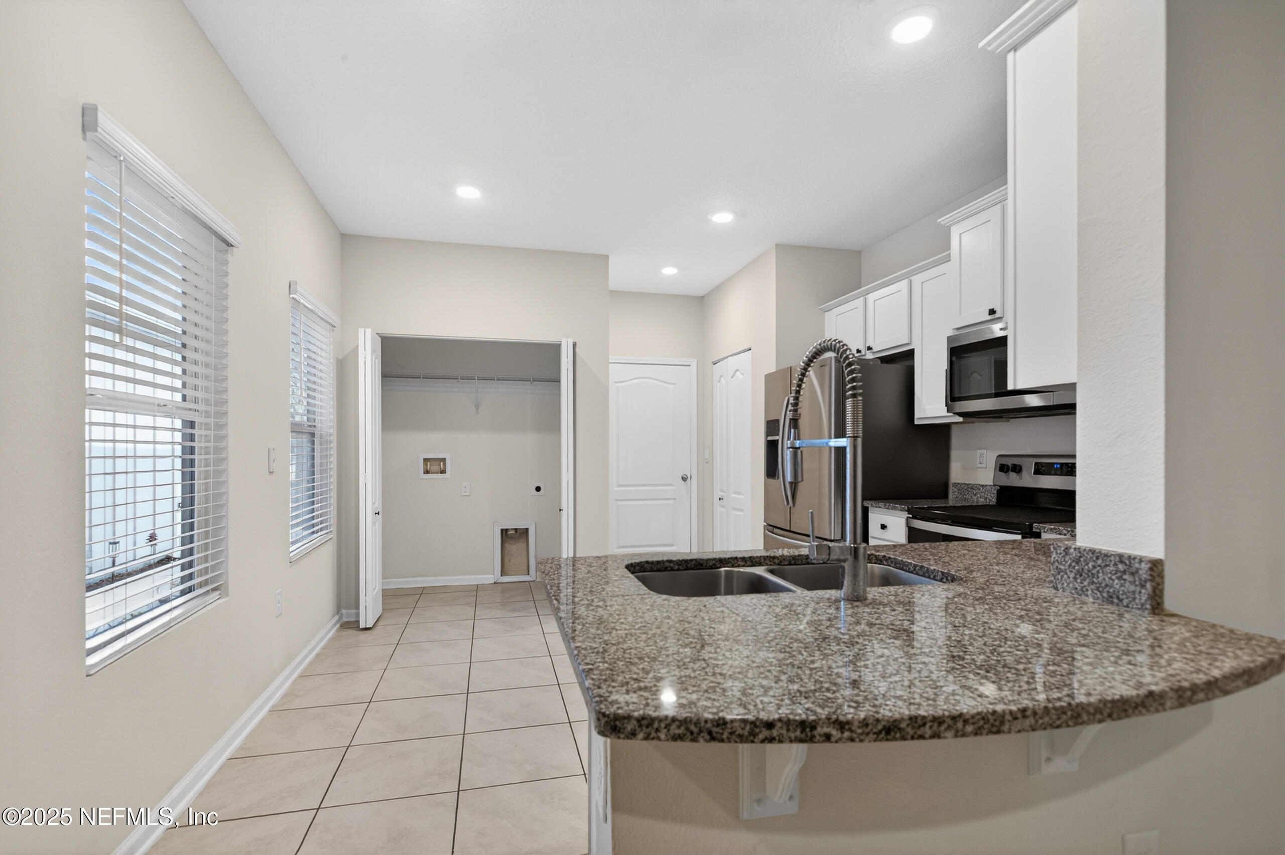 85 Talulla Trail St. Augustine, FL 32095 - Photo 10 of 55 a view of kitchen with stainless steel appliances granite countertop sink and refrigerator