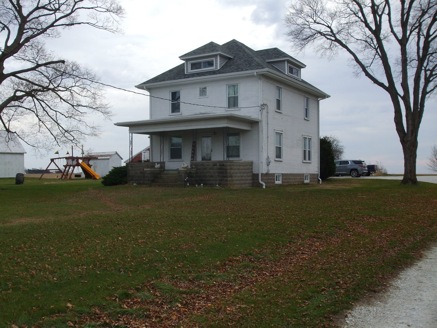 23175 Litwiller Road Delavan, IL 61734 - Photo 1 of 37 a front view of a house with a garden