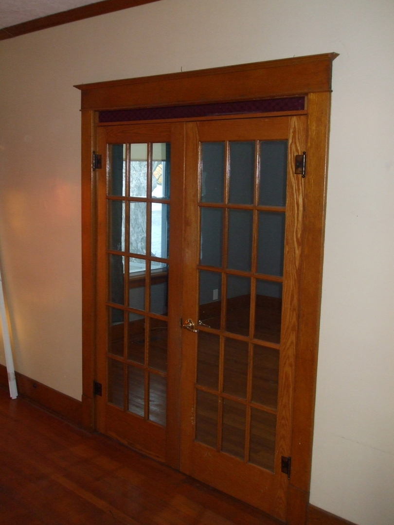 23175 Litwiller Road Delavan, IL 61734 - Photo 16 of 37 a view of empty room with wooden floor and windows