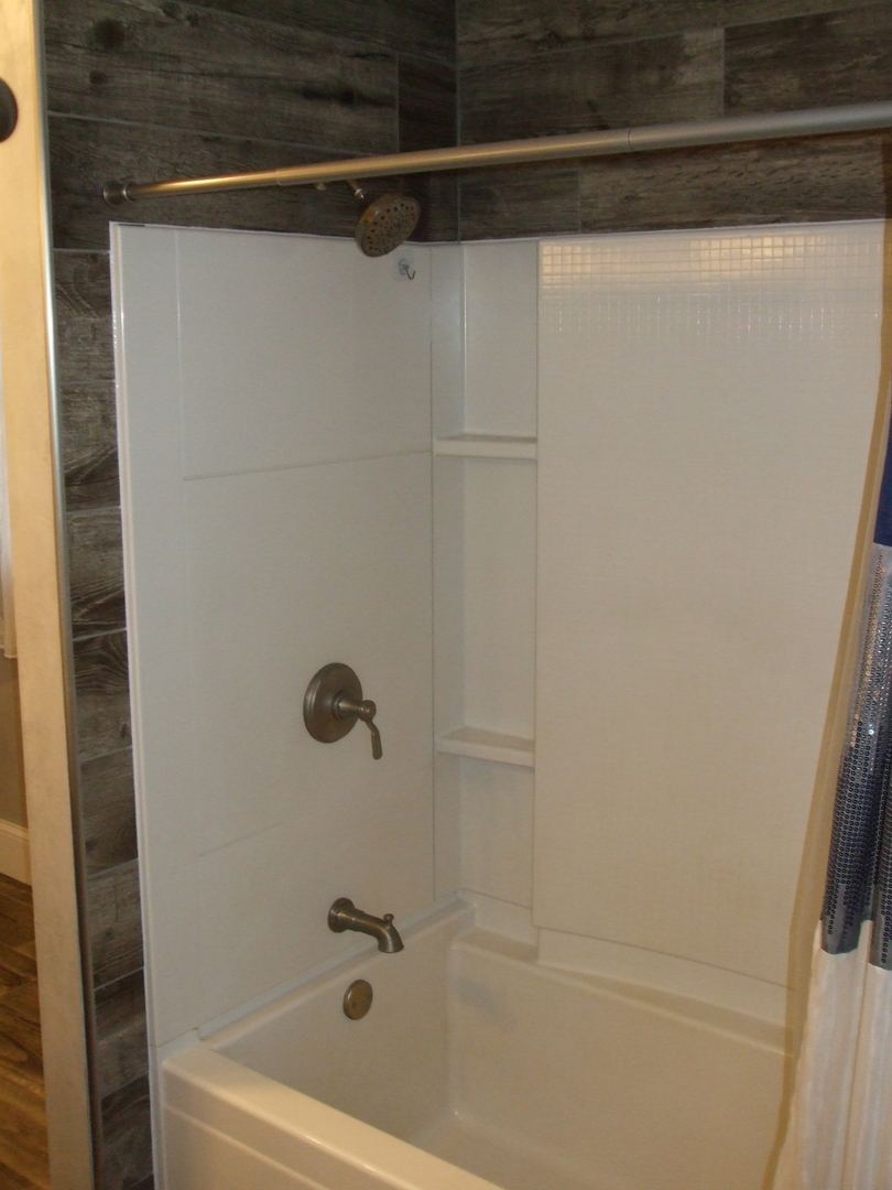 23175 Litwiller Road Delavan, IL 61734 - Photo 19 of 37 a close view of a bathtub in bathroom