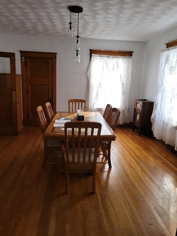 23175 Litwiller Road Delavan, IL 61734 - Photo 8 of 37 a view of a dining room with furniture window and wooden floor