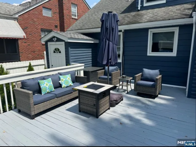 a patio with table and chairs