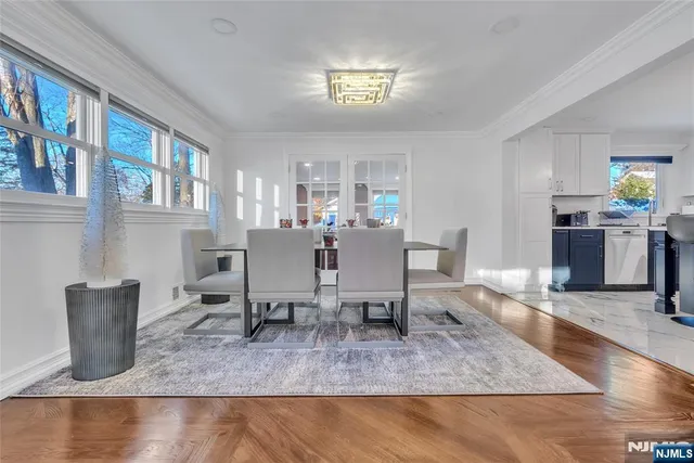 a workspace with furniture hardwood and a window