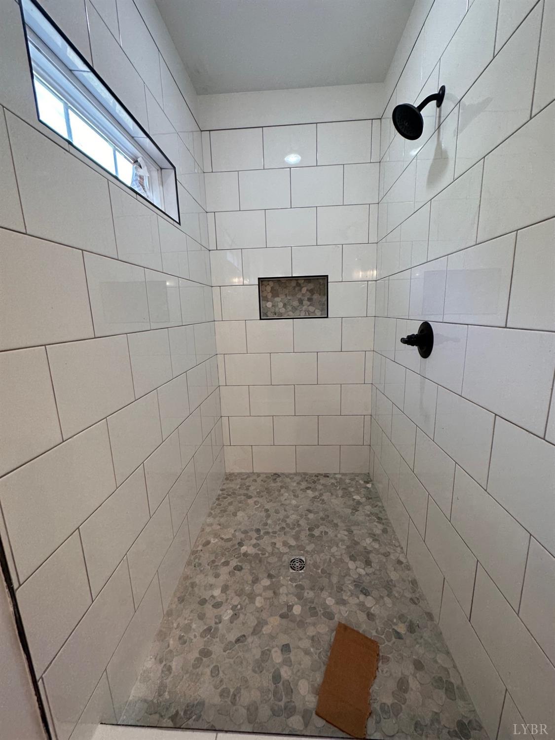 2811 Everett Road Forest, VA 24551 - Photo 20 of 49 a bathroom with a shower