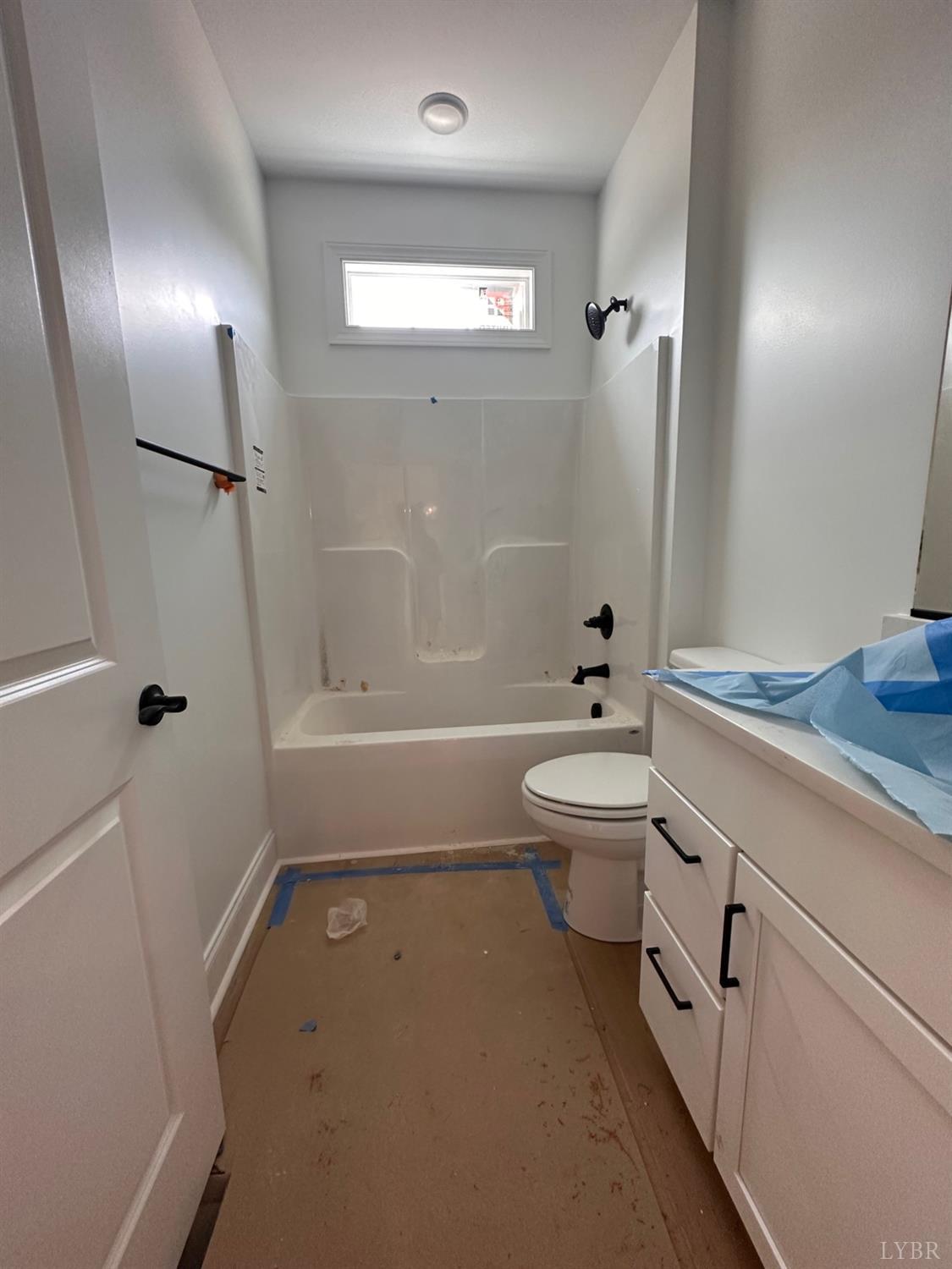 2811 Everett Road Forest, VA 24551 - Photo 25 of 49 a bathroom with a sink a toilet and shower