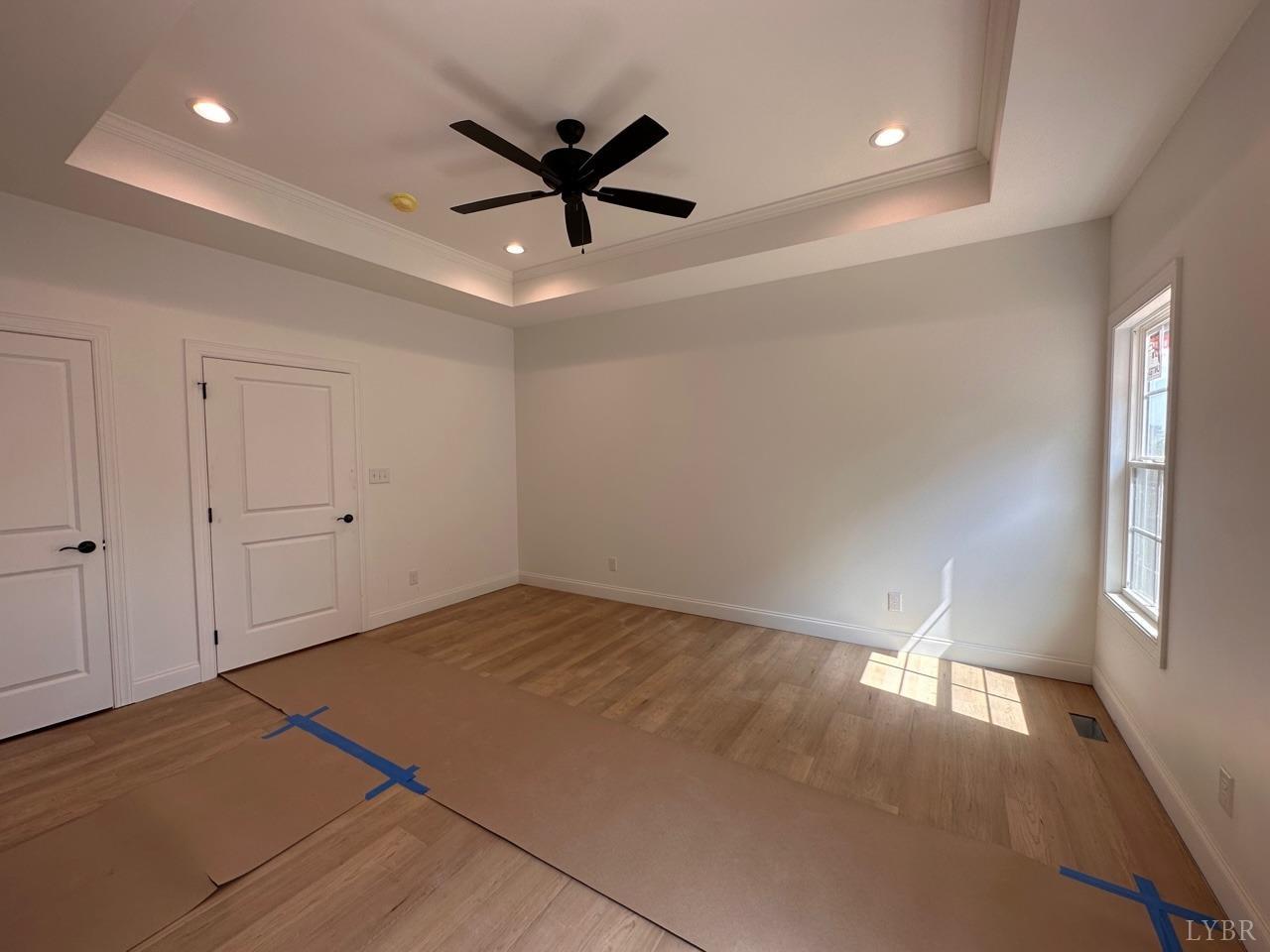 2811 Everett Road Forest, VA 24551 - Photo 30 of 49 a view of a livingroom with a ceiling fan and window