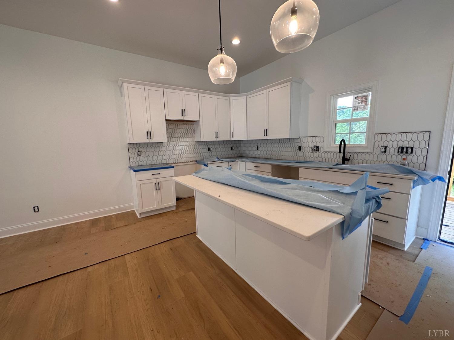 2811 Everett Road Forest, VA 24551 - Photo 7 of 49 a kitchen with a sink cabinets and window