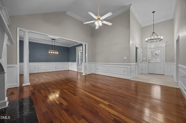 a view of a kitchen with an empty space and a window