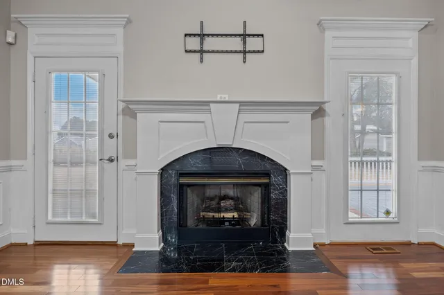 a kitchen with stainless steel appliances granite countertop a sink and cabinets
