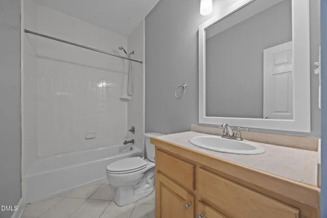 a white bath tub sitting next to a window