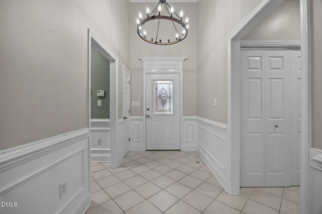 a view of an entryway with wooden floor