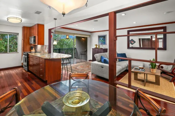 a kitchen with granite countertop lots of counter top space and dining table