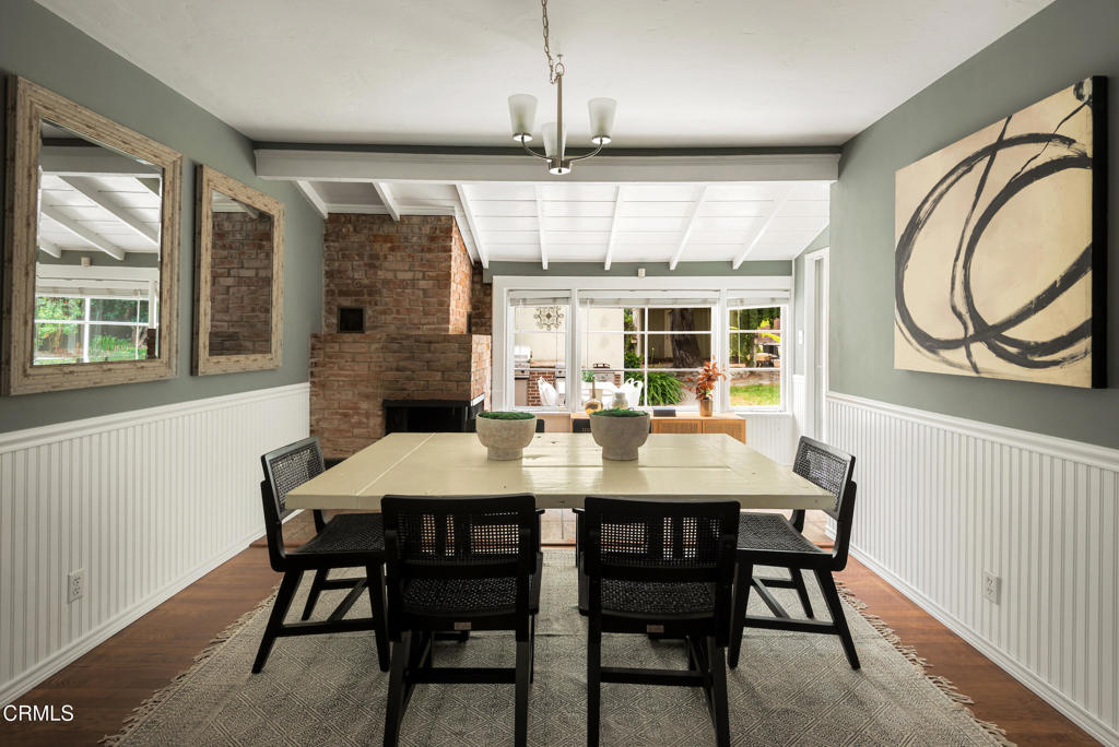 1873 North Harding Avenue Altadena, CA 91001 - Photo 11 of 55 a dining room with stainless steel appliances granite countertop a dining table and chairs