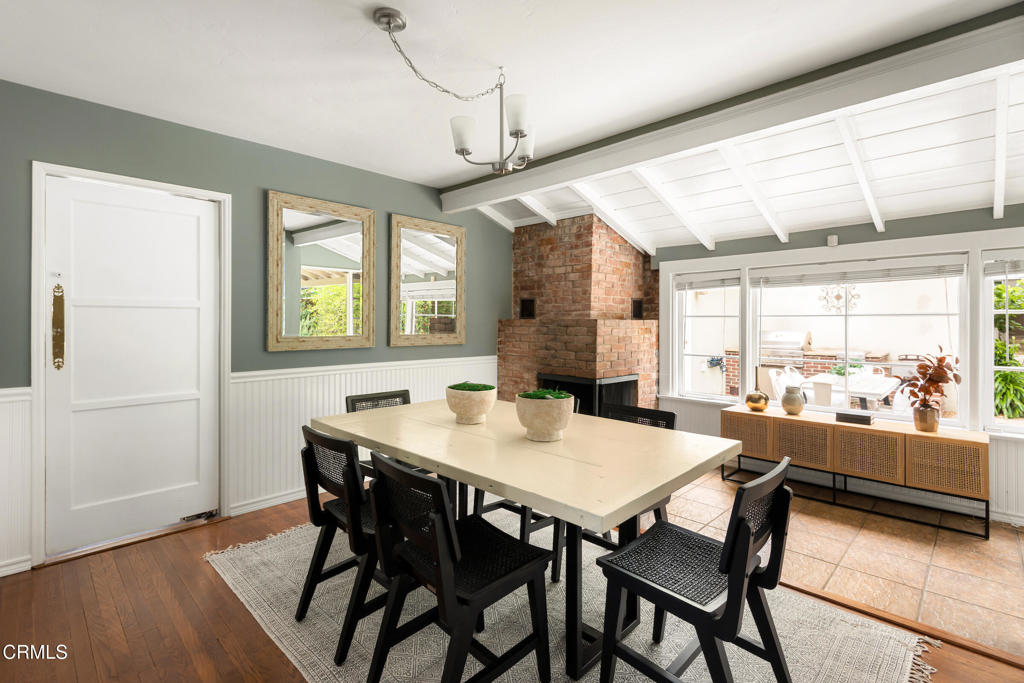 1873 North Harding Avenue Altadena, CA 91001 - Photo 12 of 55 a view of a dining room with furniture and a window