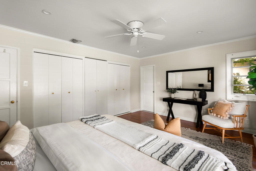 1873 North Harding Avenue Altadena, CA 91001 - Photo 32 of 55 a bedroom with a bed and a chair