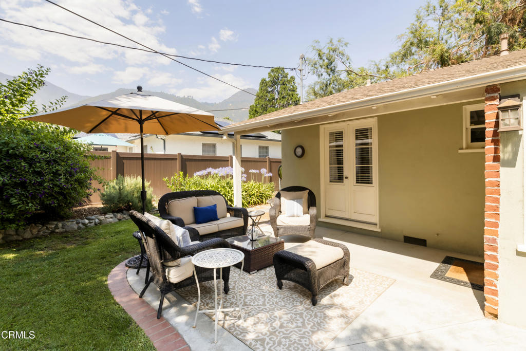 1873 North Harding Avenue Altadena, CA 91001 - Photo 36 of 55 a backyard of a house with table and chairs