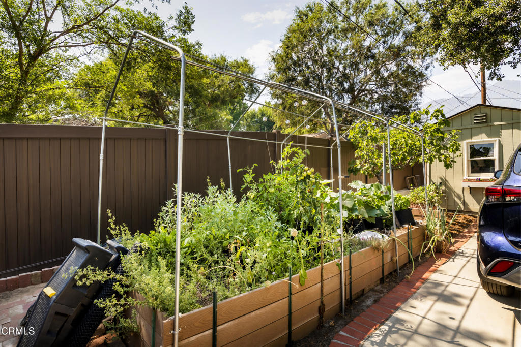 1873 North Harding Avenue Altadena, CA 91001 - Photo 46 of 55 a garden filled with lots of potted plants