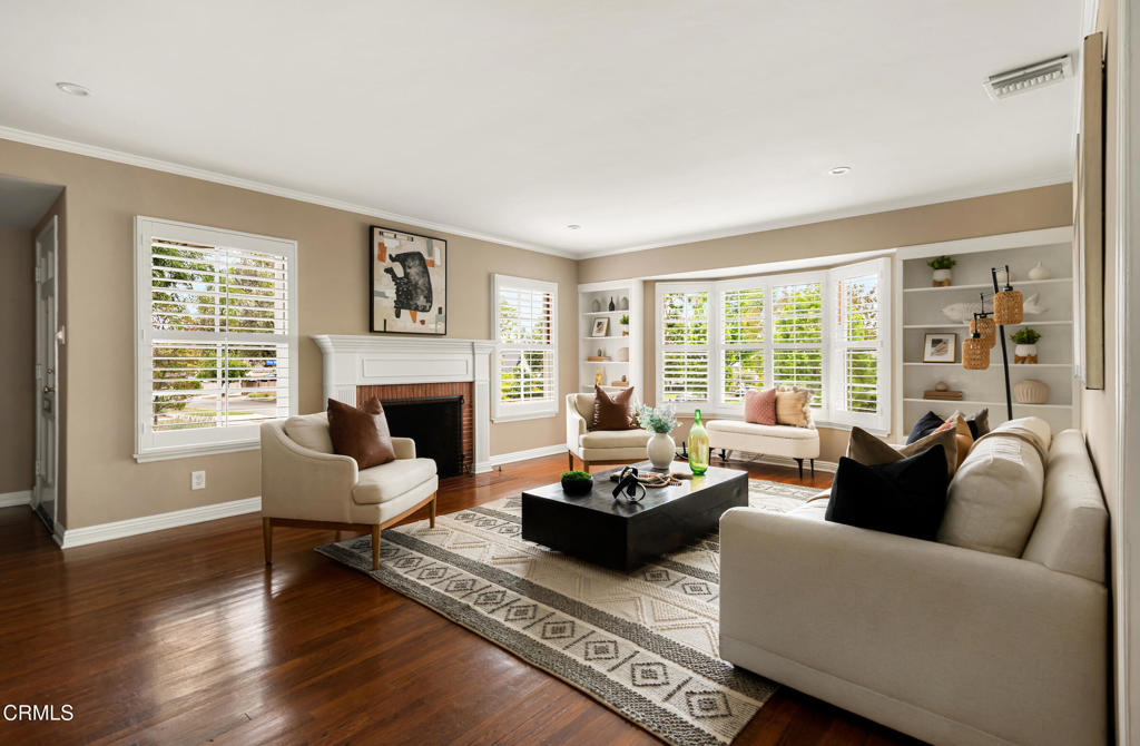 1873 North Harding Avenue Altadena, CA 91001 - Photo 5 of 55 a living room with furniture a fireplace and a large window