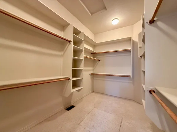 a bathroom with a tub and shower