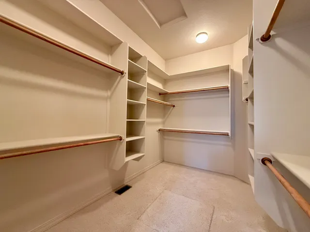 a bathroom with a tub and shower
