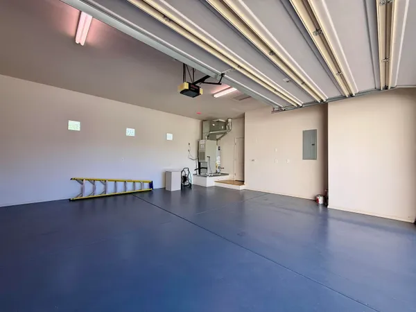 a view of a house with a tree