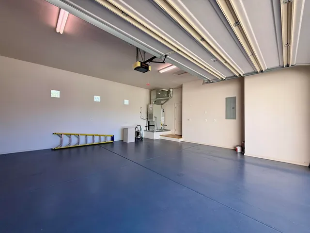 a view of a house with a tree