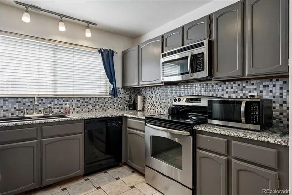 $420,000 | 9087 Bear Mountain Drive, Highlands Ranch, CO 80126