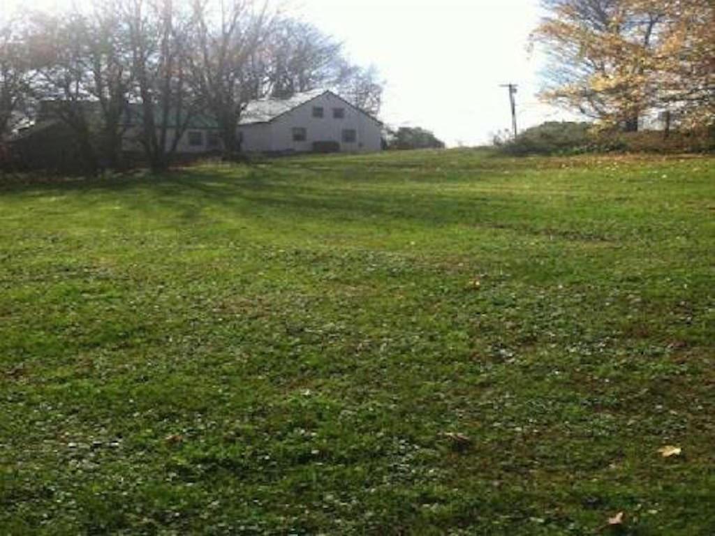 362 Middle Road Fairfield, ME 04937 - Photo 8 of 28 Backyard