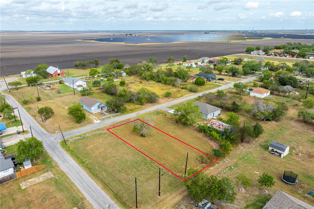 606 Porter Street Taft, TX 78390 - Photo 3 of 10 a view of a balcony with wooden floor and a lake view