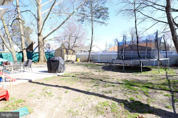 a view of yard and covered with snow